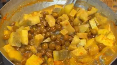 South Indian black chickpea and yam curry topped with crunchy roasted coconut 4